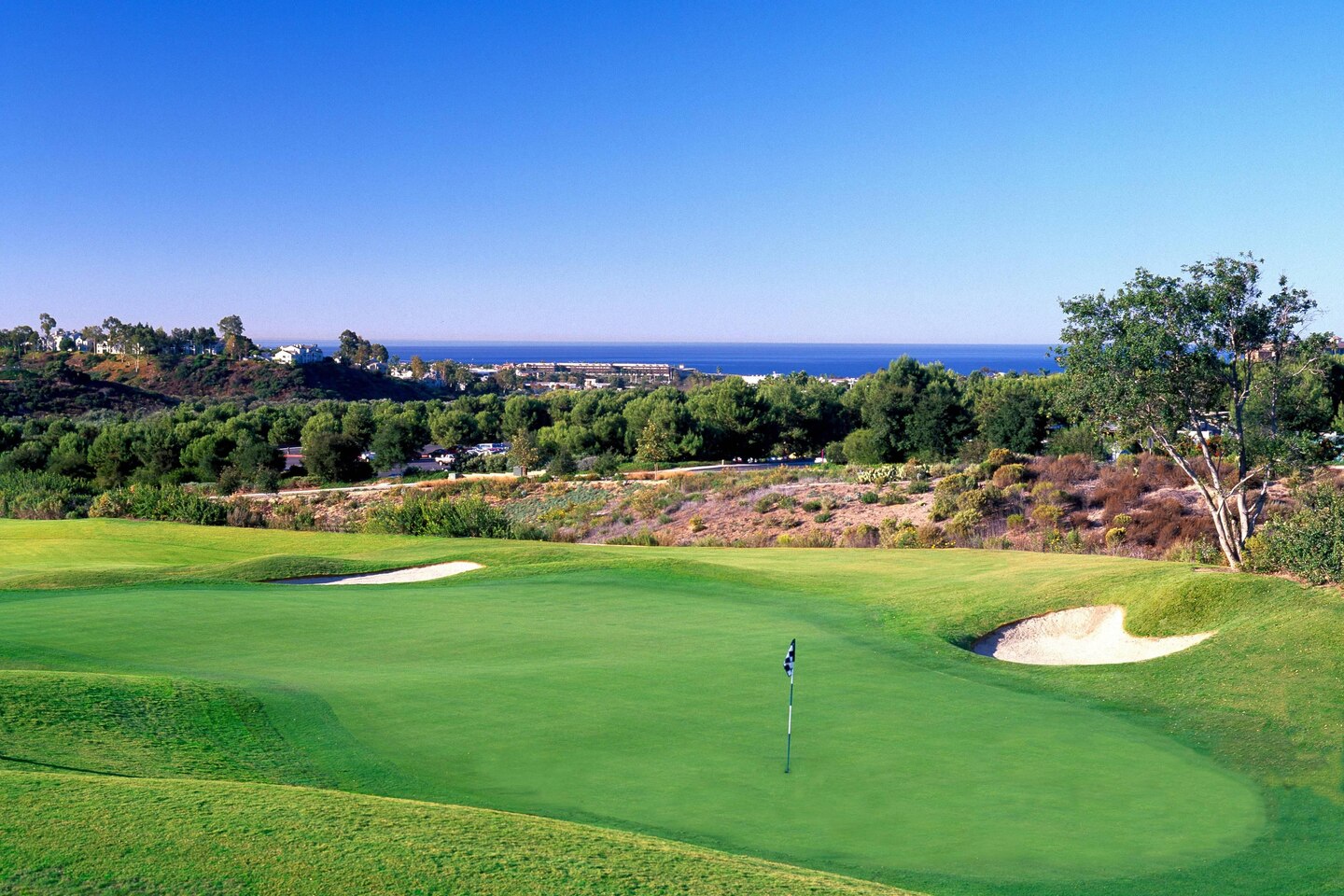 Our hotel is located adjacent to the Crossings Carlsbad. The Crossings Carlsbad offers a wonderful golf experience with coastal views.